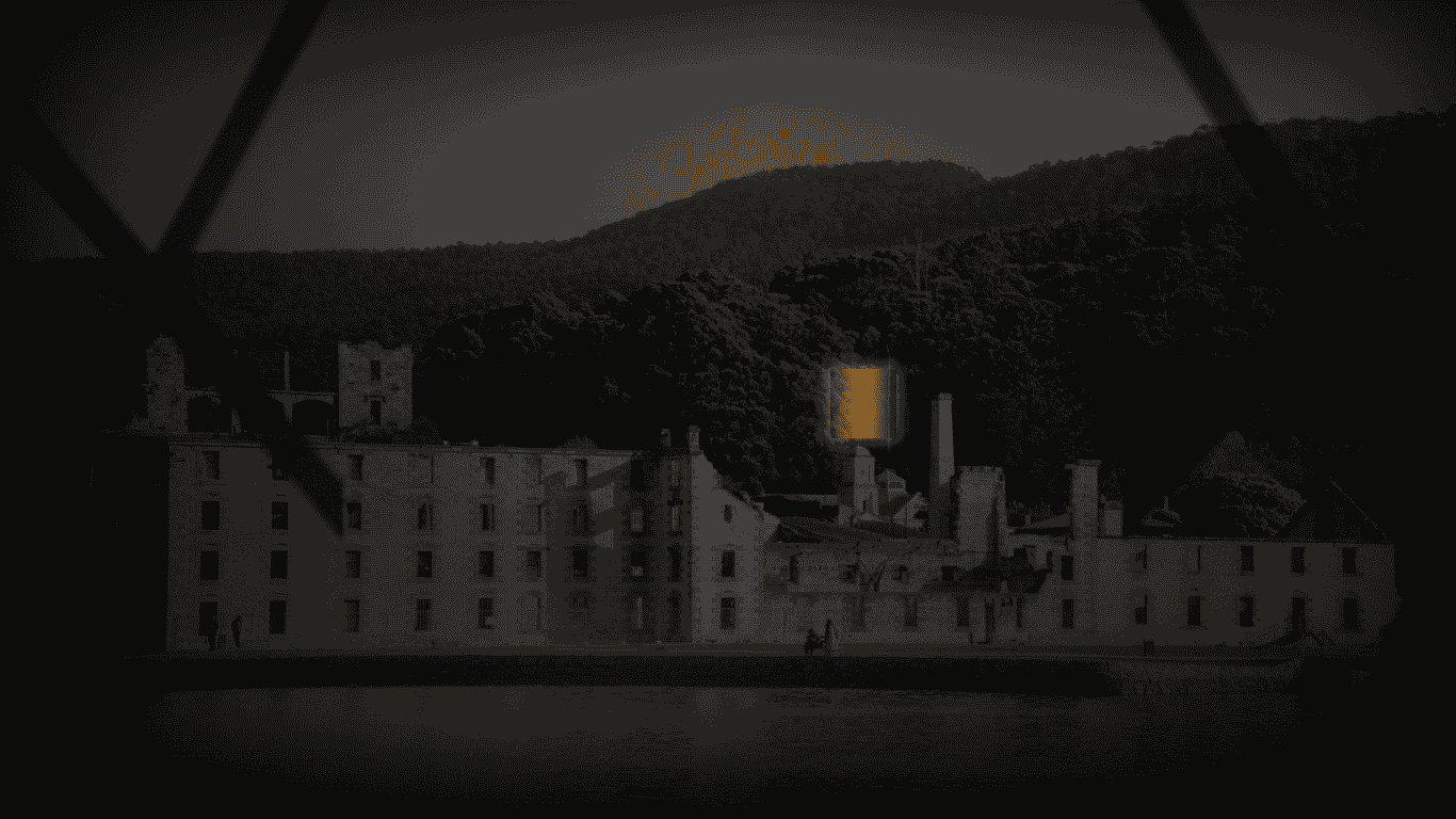 Cinematic view of a spooky, fog-covered historical colonial building representing the most haunted places in Australia at twilight